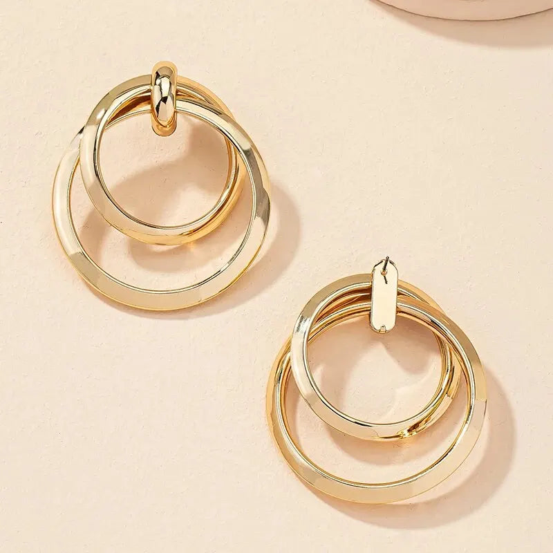 Gold twisted large hoop earrings for women