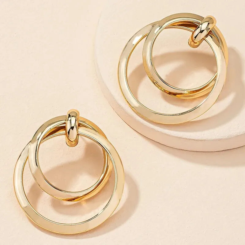 Gold twisted large hoop earrings for women